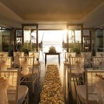Weddings in Bali | Image Credit: Ishan Mallaik, The Legian Bali-Weddings-The-Beach-House-Sunset-White-Wedding, CC BY-SA 4.0