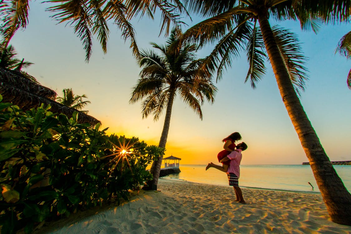 A couple in a beach in Maldives